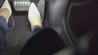 short revving in white pumps