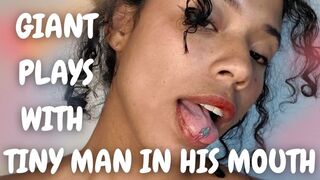 GIANT PLAYS WITH TINY MAN IN HIS MOUTH