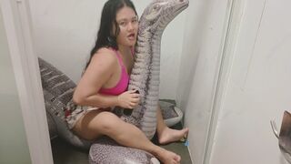 Inflatable dino ride in bathroom