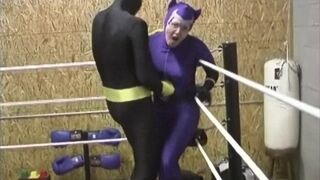Bound And Beaten Yellow Bats Belly Beating On Cat Woman