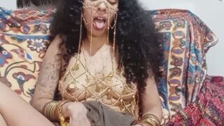 Hairy arabian Bibi Hourani playing with sword