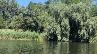 Valeri deflate beachballs on river