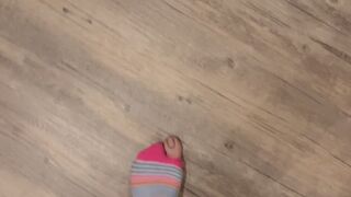 Walking in the house in my holey socks