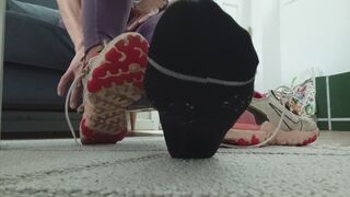 Removing sweaty trainers and socks after the gym.