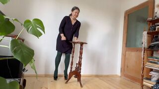 girl at the registration board suffering from pain on her feet