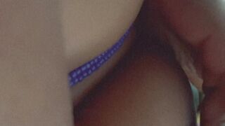 Stimulating my nipples while I watch TV.
