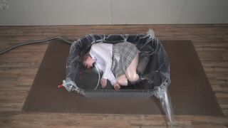 Sonya in a plastic cement bath vacuum packed