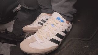 Amelie drives back from the gas stain wearing her Adidas Samba sneakers