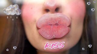 Pillow-soft Glossed Lips in a Melting Sensual Kiss