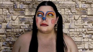 Clown with pigtails rolling eyes