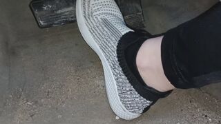 Evalynn returning from the store in beach sneakers