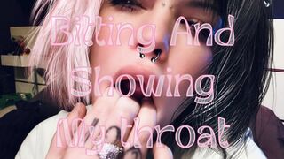 Biting my fingers and showing my throat