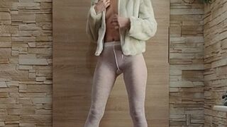 ANIA - A white outfit with high heels.