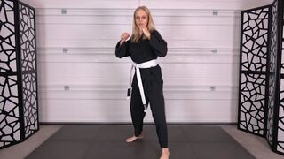 ASHLEY EARNS HER YELLOW KARATE BELT
