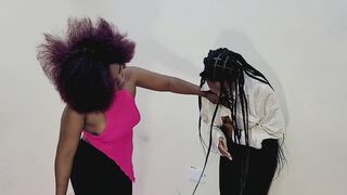 Energetic belly punching uppercat punching and hook belly punching between Jenny and Eunice