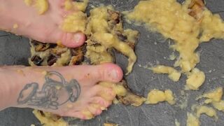 Banana squash, standing on ripe bananas, watch it squelch between my toes