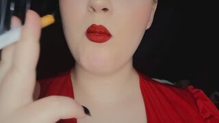 Anna closeup smoking with red lips