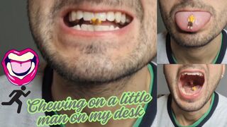 Crushing little man on my desk