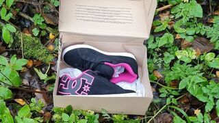 Pink DC sneakers muddy