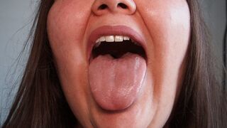 Tongue on camera - close-up