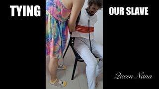 Mistresses Tying Man to Chair - 1080p - Queen Nana and Mistress Poona tie their white slave boy to a chair with Shibari rope and kick him copy