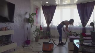 vacuuming a room in dirty socks