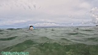 Carissa snorkeling in the Pacific Ocean in the hibiscus bikini