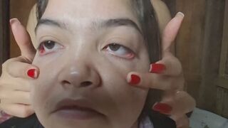 “Playing with my eyes: She stretches them and has fun with my face”