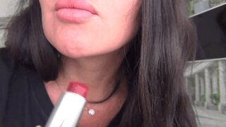 The smell of my lips and red lipstick on the glass b