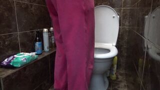 sit on the toilet with relief