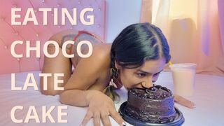 EATING CHOCOLATE CAKE