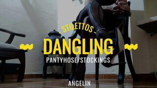 A teacher with pantyhose and stiletto heels hanging on her feet (1)