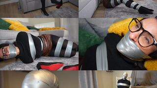 Sarah wild and her big tape bondage escape challenge: tape bound, gagged and tape hooded (mp4)