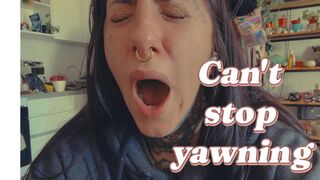 Tired girl yawning nonstop
