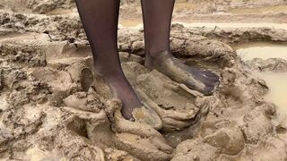 Black stockings in mud, walking barefoot in stockings, muddy stockings, feet in mud, wrecked stockings