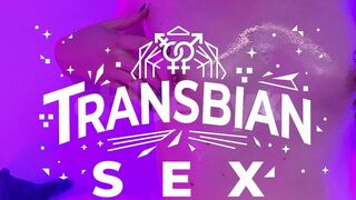 Trans girl fucks oiled up tight pussy in neon lights