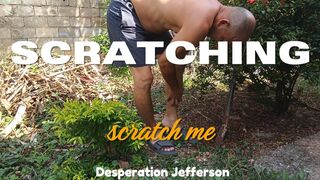 Man scratching his feet when doing manual work at home (T)