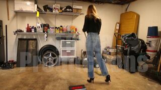 Cassandra Sweeping in High-Waisted Jeans & Stiletto Pumps