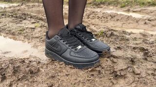 Nike sneakers getting stuck in mud, muddy sneakes, wrecked sneakers, nike sneakers sinking in deep mud
