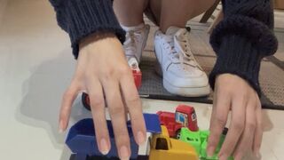 Laura Crushing Toy Cars