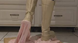 Princess getting glued in her beige boots