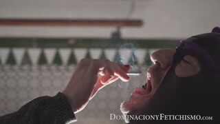 DOMINA DAMSEL relaxes by smoking and using her HUMAN ASHTRAY