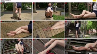 After class, the sexy and voluptuous university teacher, Jun Jun, wearing high heelsand nude stockings, seductively displayed her beautiful legs and long, slenderfeet on the stairs next to the classroom
