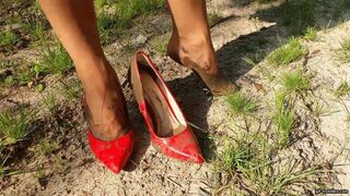 businesswoman loses her red shoe in the mud HD mp4 1920x1080