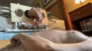 The Strap with cumshot - Bastinado with a belt and tickling