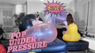big balloon pop under pressure