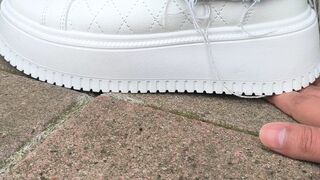 My neighbor trampling My hand ( sneakers)