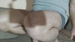 Naked, muscular, hairy legs and feet