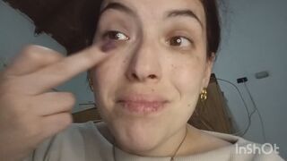 Applying eye makeup