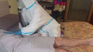 NAUGHTY NURSE NASTYA TREATS HER VERY SICK PATIENT WITH HANDJOB UNTIL HE CUMS USING heavy duty PPE and a gas mask